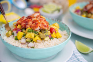 Roasted Jerk Shrimp with Cauliflower Rice & Fruit Salsa in a blue serving bowl