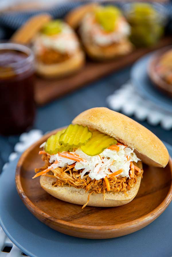 Quick BBQ Chicken Sliders on a wooden plate